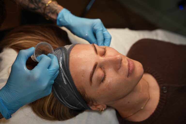 A close-up of a beautiful blonde women receiving a medical boutique service at Grace Hill in Winnipeg
